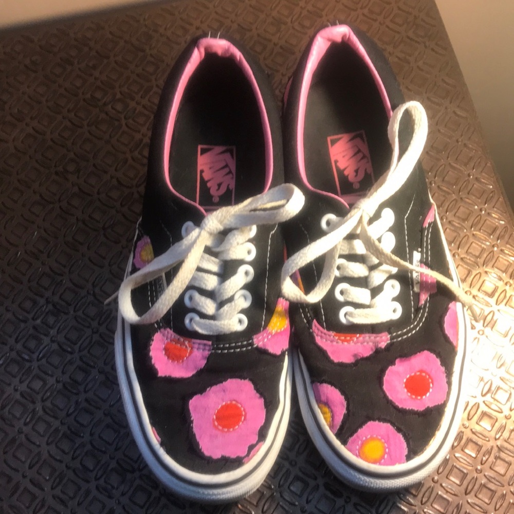 Vans floral lace up sneaker with 3D type flowers.